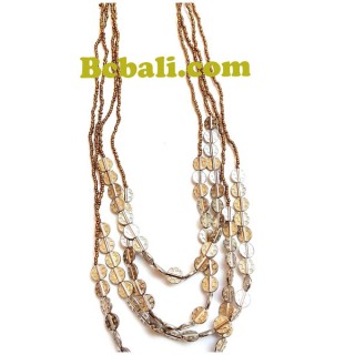 casandara golden glass bead quatro strand charm long