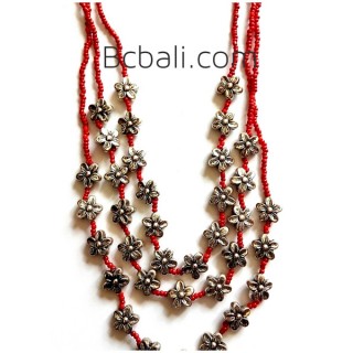 three strand beaded necklaces flowers charm