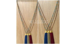 long seed crystal tassel necklace golden chrome
