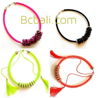 two models chokers necklaces shells tassels
