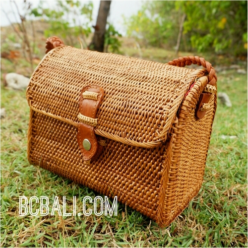 woven bag with leather straps