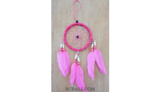 spider dream catcher feathers with bone pink color